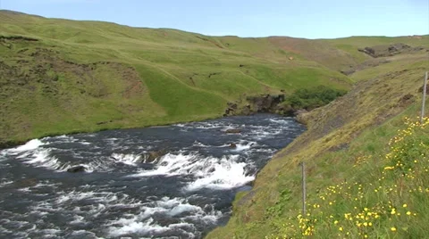 Pan left on river rapids until waterfall brink / crest Stock Footage 37588175