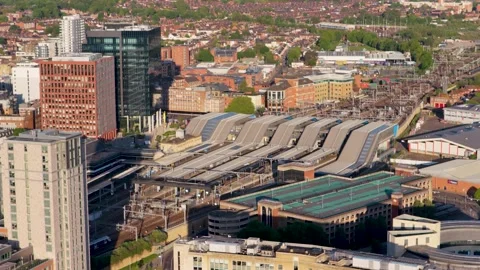Pan left towards station train arriving Reading Station UK Stock-Footage 336336186