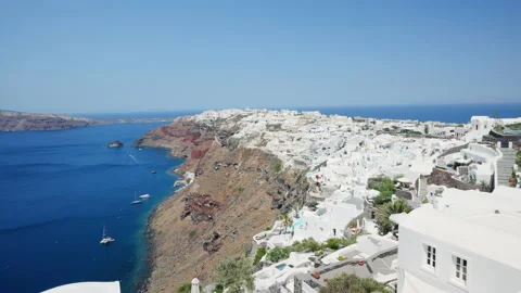 Pan left view of Oia and Santorini caldera, Greece Stock Footage 220230830