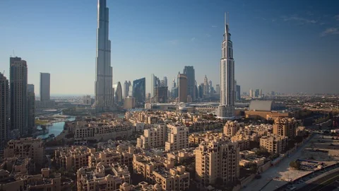 Pan left while ascending to 100m from Downtown Dubai. Stock Footage 98929070