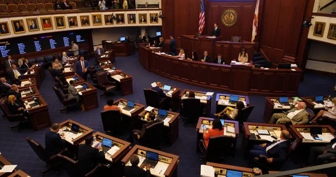 Pan left wide shot Florida Senate Chamber during floor debate, 2019 session Stock Footage 107572602