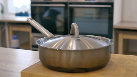 Pan with a lid on the table rotation camera Stock-Footage 125922559