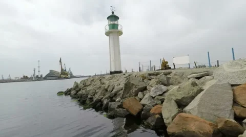 Pan Up  Lighthousein port Stock Footage 62412389