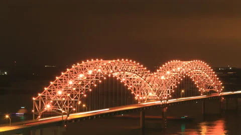 Pan of lit I-40 Hernando DeSoto Bridge at Memphis, exclusive timelapse 4K Stock Footage 170780466