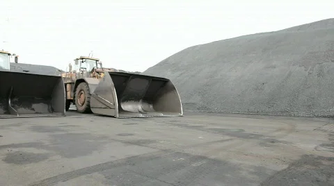 Pan of loaders Stock Footage