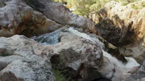 Pan looking down on waterfall Upper Nethercote Falls NSW Australia. 動画素材 11171880