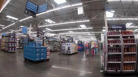 Pan of main walkway from back area Walmart retail store interior Stock Footage 157931239