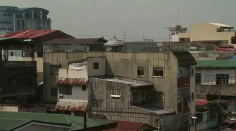 Pan of Manila Rooftops right Stock Footage 11495224