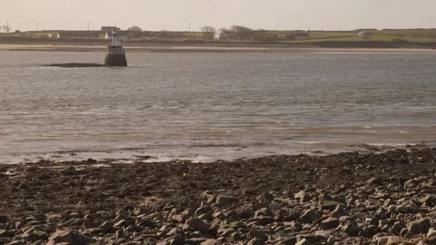 Pan up of metal man at Rosses Point. Stock Footage 201524924