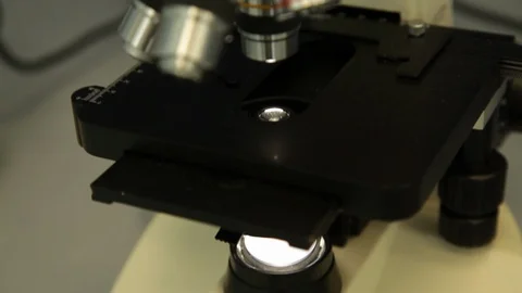 Pan up a microscope Stock-Footage 91058064