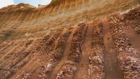 PAN mid shot of open pit side. Development of minerals. Environmental pollution. Stock Footage 87728106