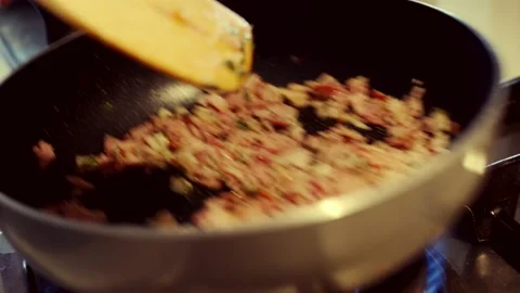 Pan Mixing, Stirring Bacon. Video stock 166829355