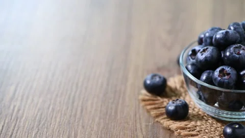 Pan motion from left to right of Blueberry with leaves Stock Footage 171074394