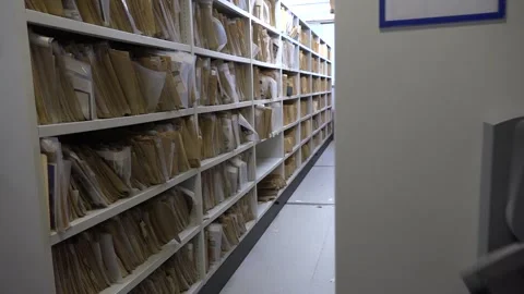 Pan Moving Archive Shelves Stock Footage