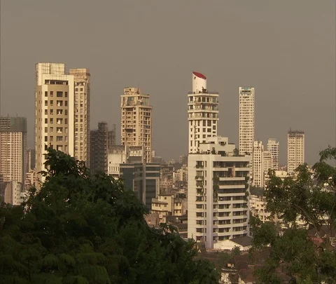 Pan from Mumbai high-rises to beach Stock Footage 86742013