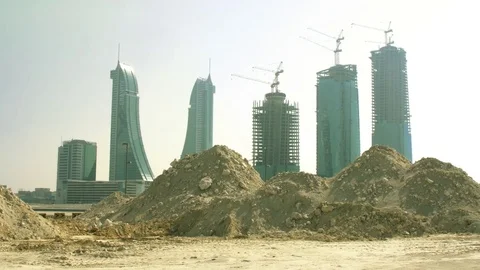 Pan from New Construction and BFH towards World Trade Center Bahrain. Video stock 73486599