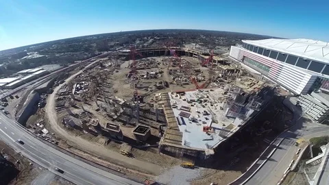 Pan of new stadium under construction in Atlanta Stock Footage 91907816