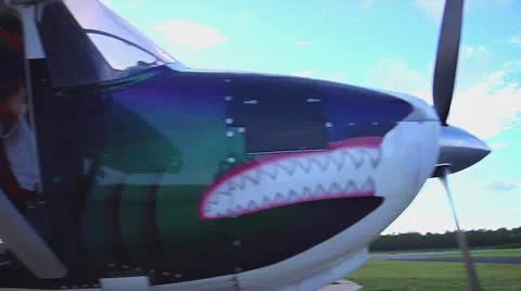 Pan From Nose of Plane to Waiting Skydivers Stock Footage 24754042