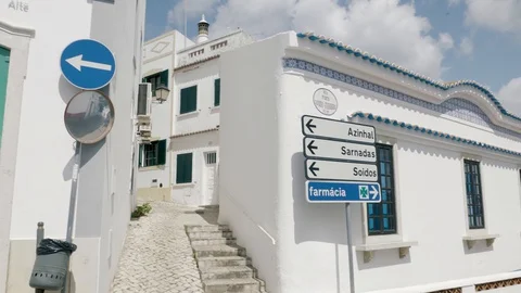 Pan of old town Albufeira cobbled streets Stock Footage 128395593