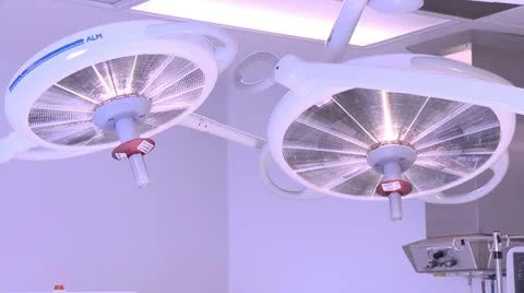 Pan of operating room  and lights Stock Footage 10903478