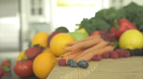 Pan of Out of Focus Produce Ends on a Yellow Bell Pepper (1 of 3) Stock Footage 47472474