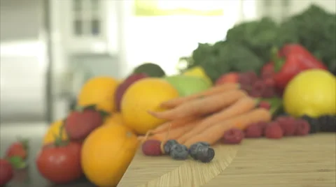 Pan of Out of Focus Produce Ends on a Yellow Bell Pepper (2 of 3) Stock Footage 47472901