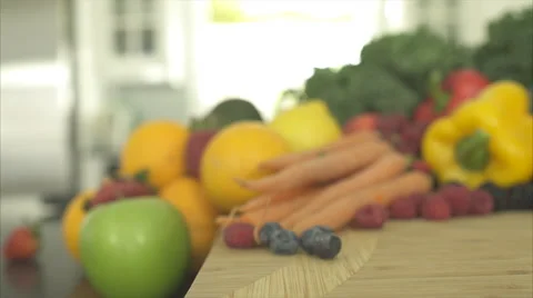 Pan of Out of Focus Produce Ends on Blackberries Stock Footage 47477804