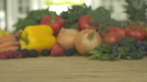 Pan of Out of Focus Produce Ends on an Orange (1 of 2) Stock Footage 47479013