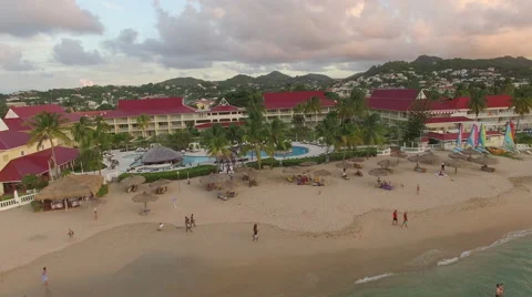 Pan over beach and resort Stock Footage 61861709