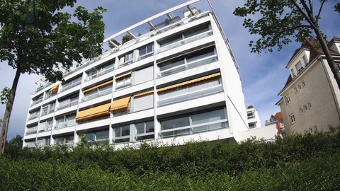 Pan over building with awning Stock Footage 79662805