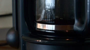 Pan Over A Coffee Machine In Function, Fragrant Coffee Brewing, Morning Stock Footage 85555862