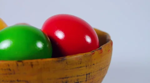 Pan Over Easter Eggs Bowl Isolated On White Stock Footage 60070201
