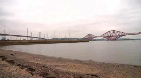 Pan over the Firthof Forth to the Forth Rail Bridge Video stock 56941382