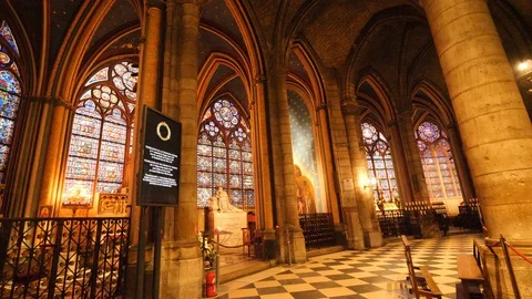 Pan over the impressive old interior of Notre-Dame Paris Stock Footage 106414661