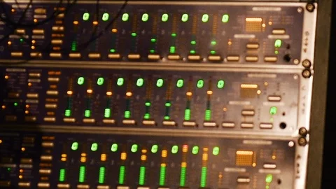 Pan over knobs and sliders in studio equipment machine 스톡 동영상 105925765