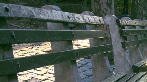Pan over long park bench Video stock 33851842