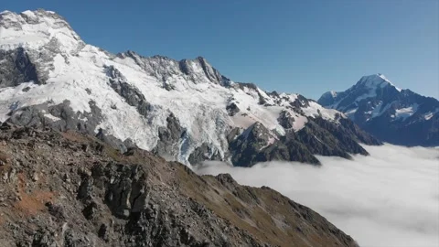 Pan over Mount Cook, New Zealand mountain range with an amazing sea of clouds Stock Footage 182366471
