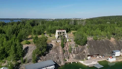 Pan Over a Old Mine Filled With Water Stock Footage 201617762
