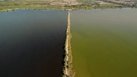Pan over a road line in the middle of a lake Stock Footage 111479685