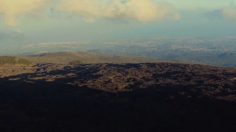 A pan over the scenic view from Mount Etna in Sicily Italy Stock Footage 88562628