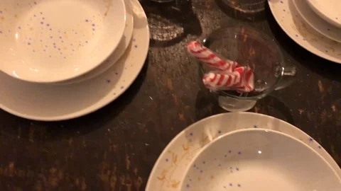 Pan over table set for Christmas meal Stock Footage 124999803