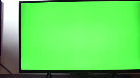 Pan Over A TV Set With Green Screen Video stock 64045313