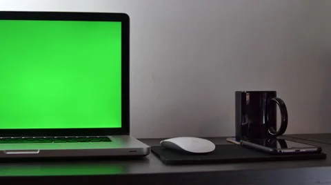Pan Over A Young Writter's Desk, Green Screen Laptop Stock Footage 64045156