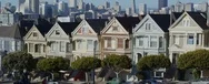 Pan Up From Painted Ladies To An Aerial View Of Downtown San Francisco Stock Footage