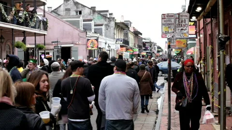 Pan of people walking down bourbon street Stock-Footage 642717