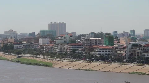 Pan of Phnom Penh riverside high angle from across river Stock Footage 48268828