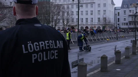 Pan from Police to Protesters Stock Footage 61919082