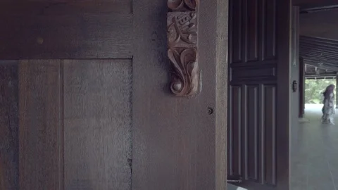 Pan up of Prophet Muhammad (pbuh) name engraved on door knob of a mosque. Stock Footage 123163777