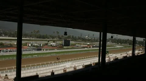 PAN OF RACETRACK FROM BLEACHERS Stock Footage 10918460