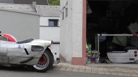 Pan: Racing machine for sidecar racing, racing motorbike and sidecar, garage Stock Footage 76769032